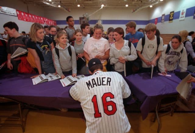 The line was several people deep to get Joe Mauer's signature in the Cretin-Derham Hall yearbook on June 5, 2001 after a news conference was held in the school gym to announce that he was the Twins' No. 1 draft pick and the No. 1 pick overall.