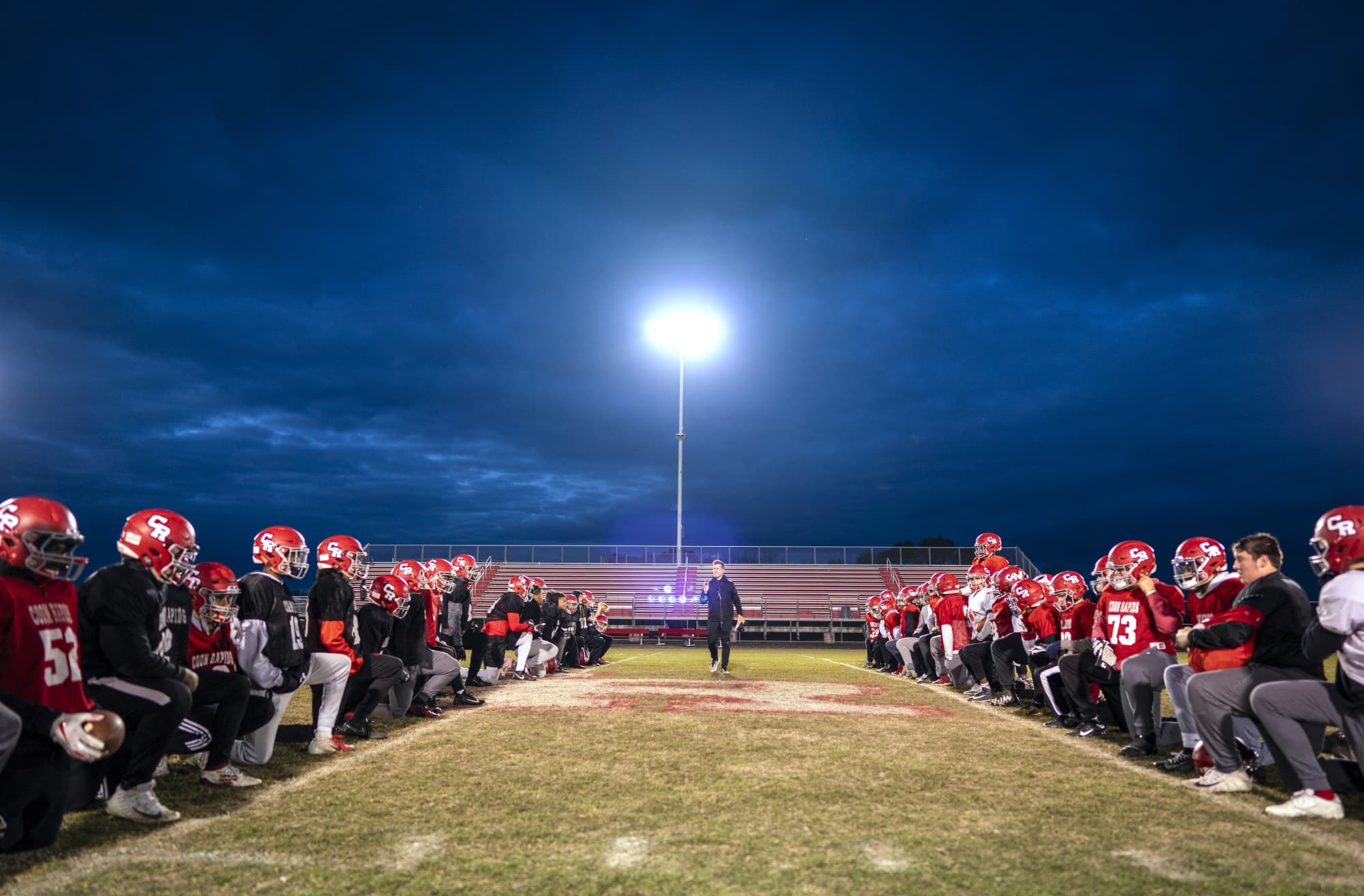 Coach Nick Rusin talked to the Coon Rapids High School football team after practice on Monday. The Cardinals play Saturday in the state tournament for the first time since they won a Prep Bowl in 1983. Photo: LEILA NAVIDI • leila.navidi@startribune.com