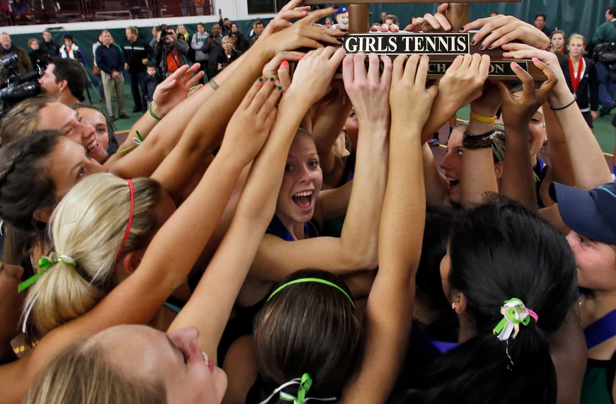 Girls Class 2A state tennis tournament finals. Edina players celebrated with their first place team trophy at the end of the tournament. . (MARLIN LEVISON/STARTRIBUNE(mlevison@startribune.com)