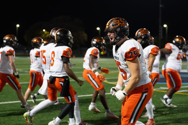 Moorhead football defeats Woodbury on the road